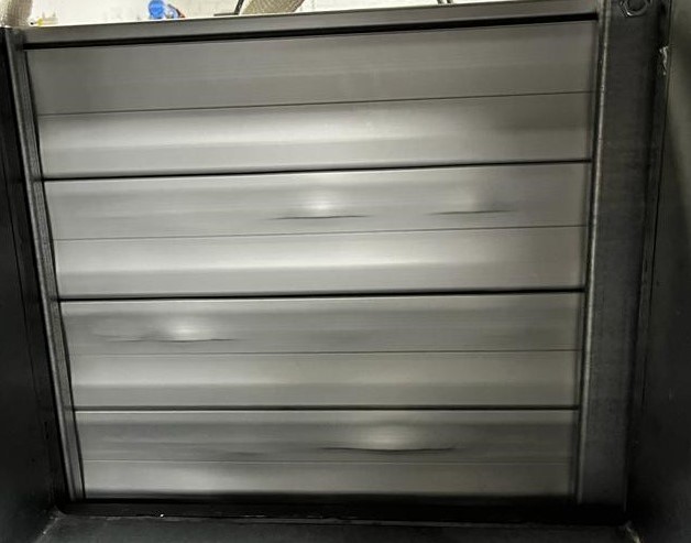 Blast resistant roller shutters